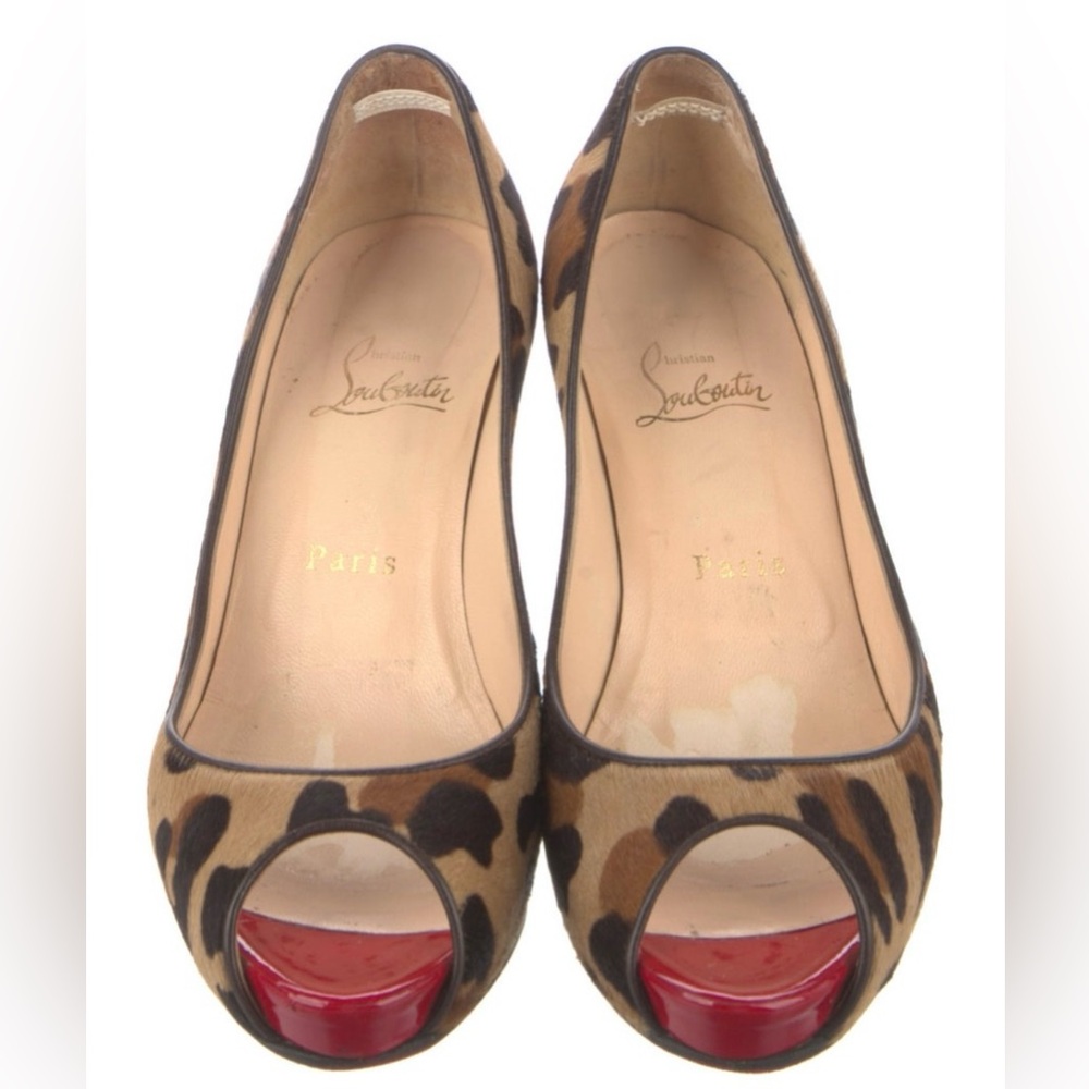 Cheetah/Leopard Print Christian LOUBOUTINS!

Size 38, but fits like a 7-7.5